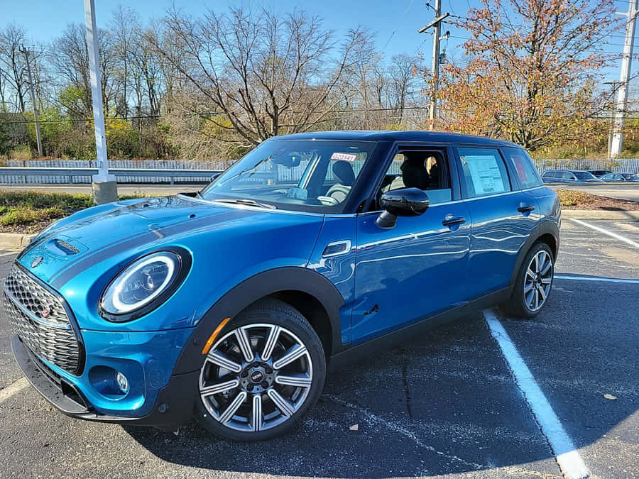 Captivating Mini Cooper S Clubman All4 On The Move Wallpaper