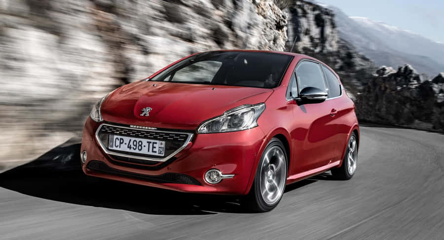 Captivating Peugeot 208 In Action Wallpaper