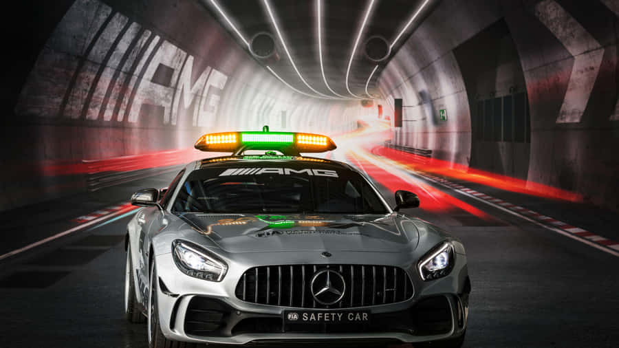 Captivating Safety Car On The Racetrack Wallpaper