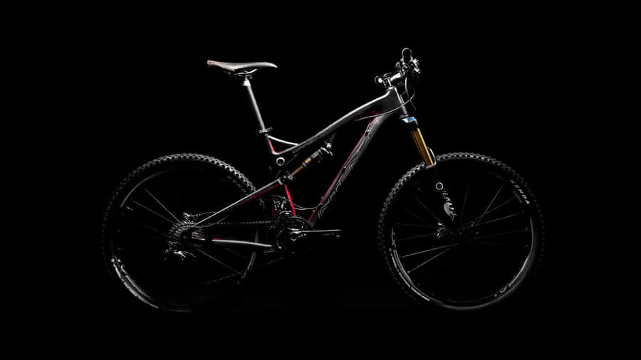 Captivating Specialized Mountain Bike In Action Wallpaper