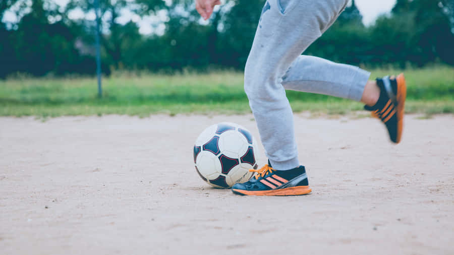 Captivating Street Soccer Showdown Wallpaper