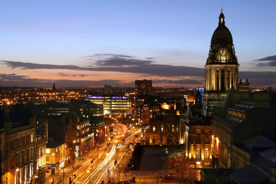 Captivating Sunrise Over Leeds City Centre Wallpaper