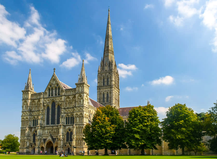 Captivating View Of Salisbury Cathedral At Sundown Wallpaper