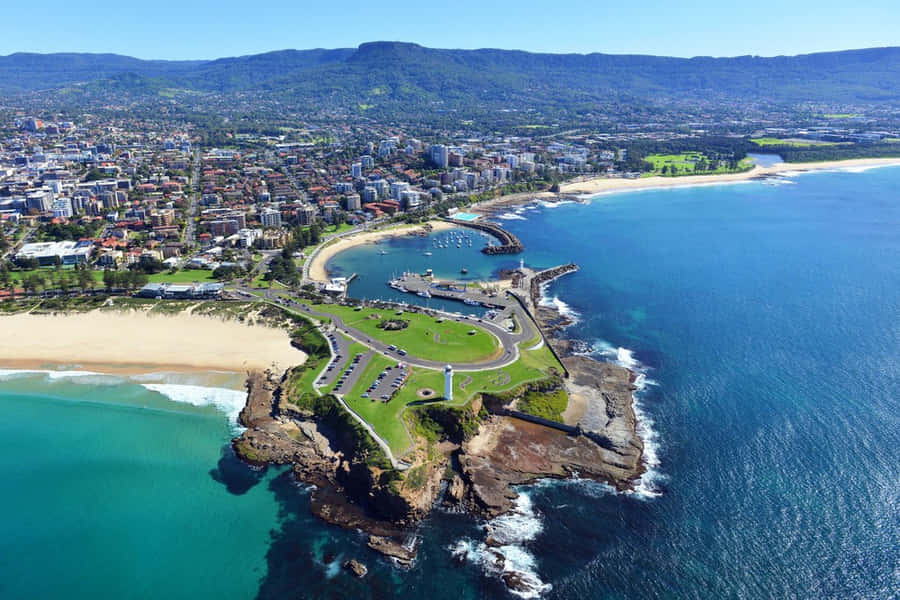 Captivating Vista Of Cabbage Tree Harbor In Wollongong Wallpaper