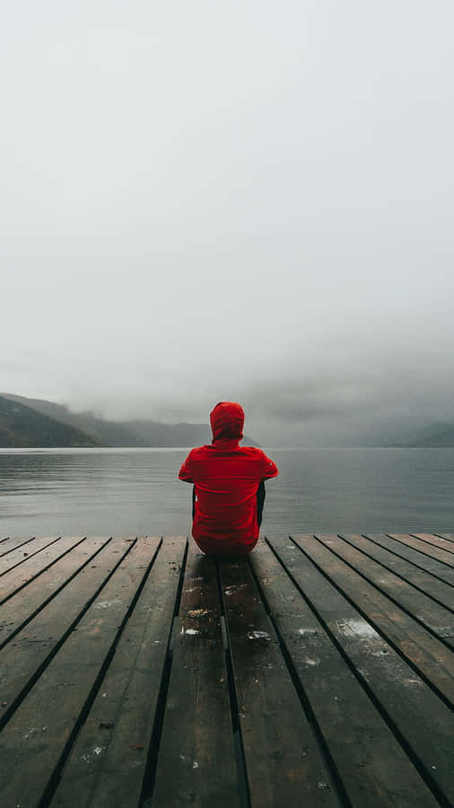 Capturing Emotion: Cool Sad Boy In Red Wallpaper