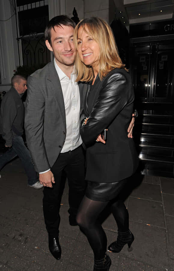 Carol Mc Giffin Smiling With Companion Wallpaper