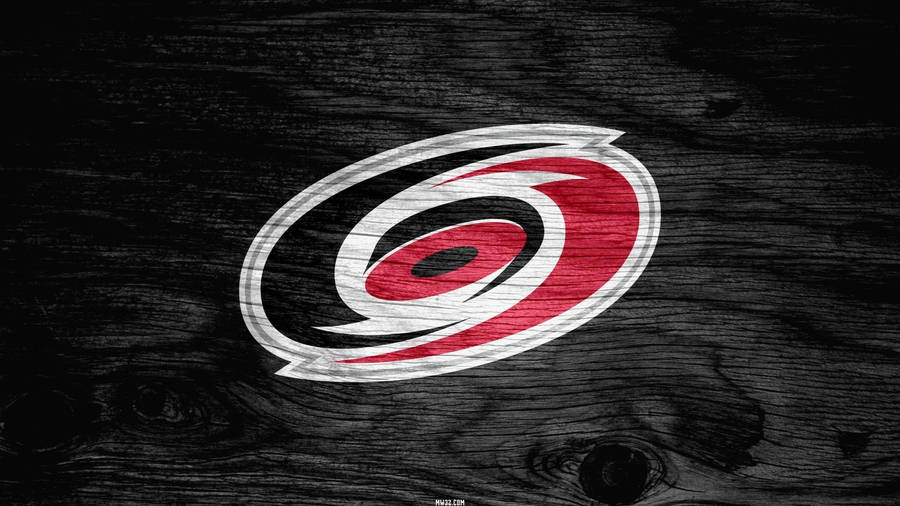 Carolina Hurricanes In Dark Wood Wallpaper