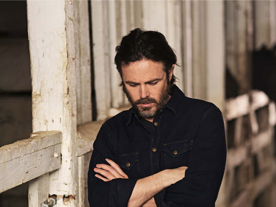 Casey Affleck Engrossed In Thought Wallpaper