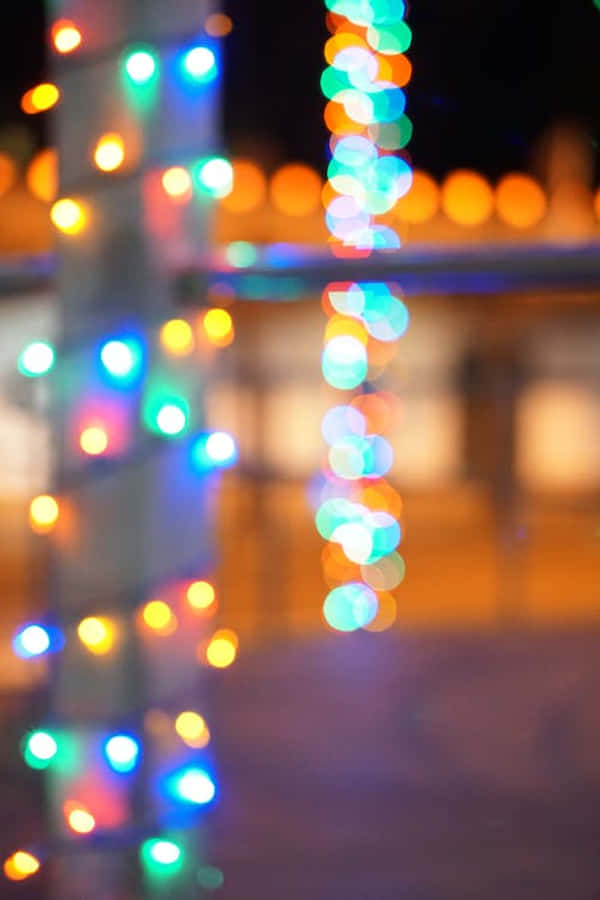 Celebrate Christmas Night Amidst The Tranquil Beauty Of A Winter Landscape Wallpaper