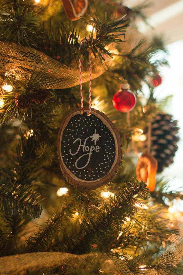 Celebrate The Charm Of Christmas With Hope & Happiness Wallpaper