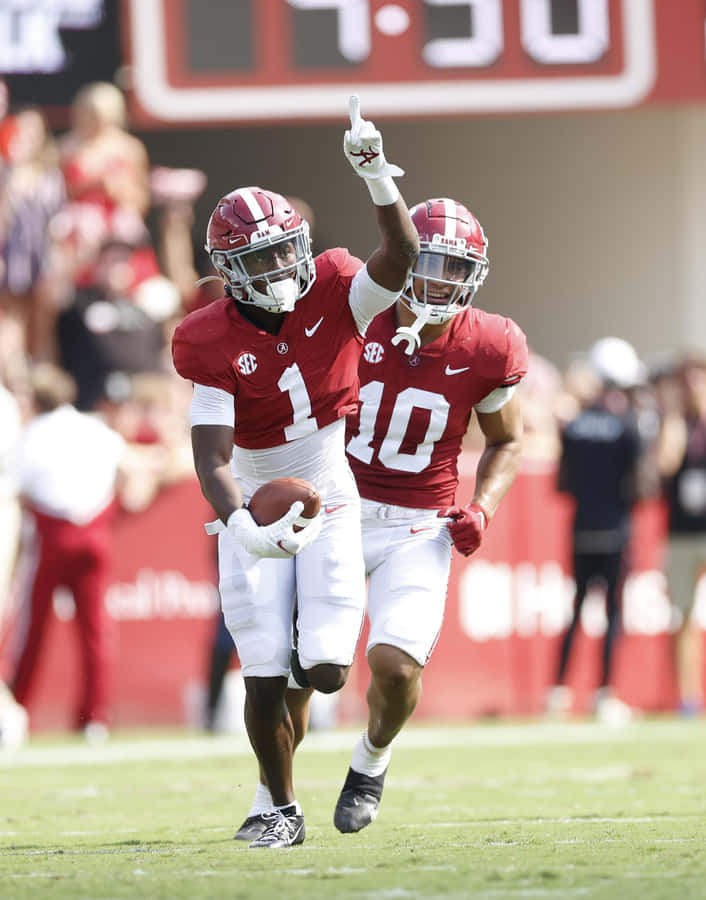 Celebratory Football Players Number1and10 Wallpaper