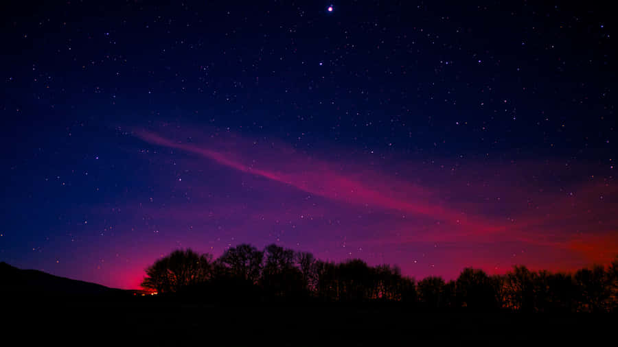 Celestial Symphony In 4k - A Mesmerizing Starry Sky Wallpaper