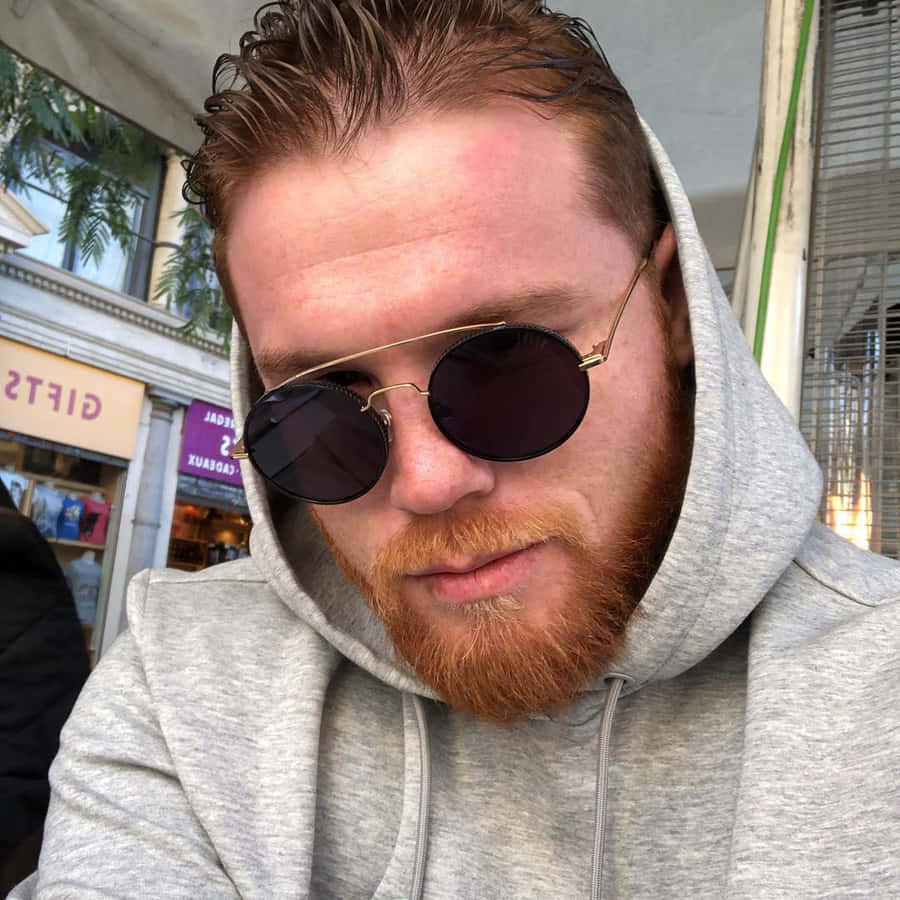 Champion Boxer Saul 'canelo' Alvarez Posing For A Selfie Wallpaper