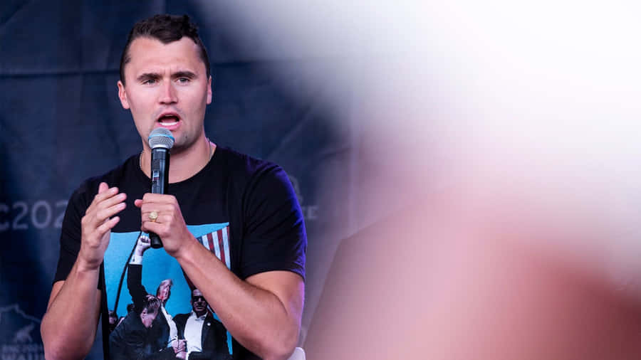 Charlie Kirk Speaking At Event Wallpaper