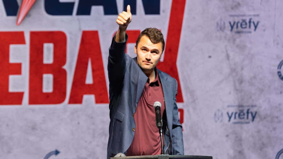 Charlie Kirk Speaking At Event Wallpaper