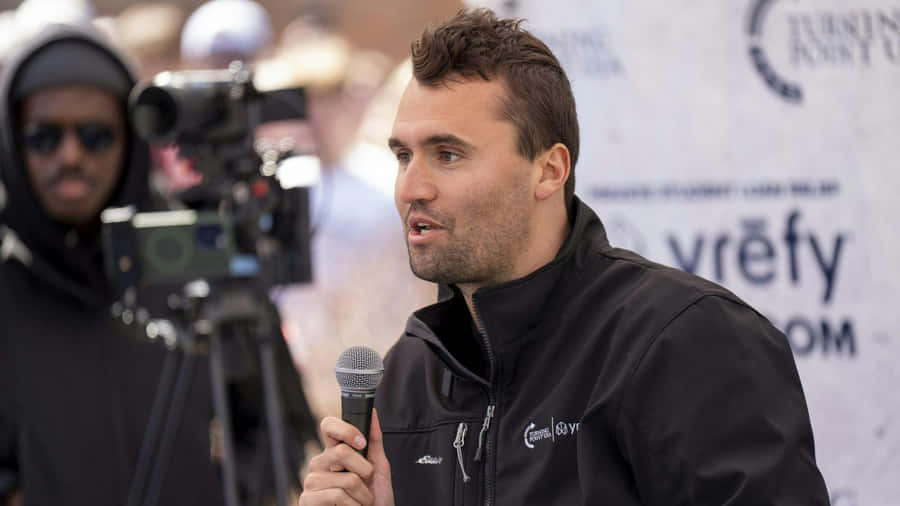 Charlie Kirk Speaking At Event Wallpaper