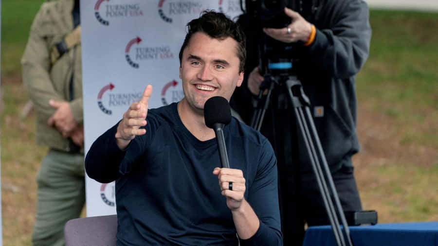 Charlie Kirk Speaking At Event Wallpaper