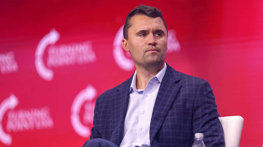 Charlie Kirk Speaking Engagement Wallpaper
