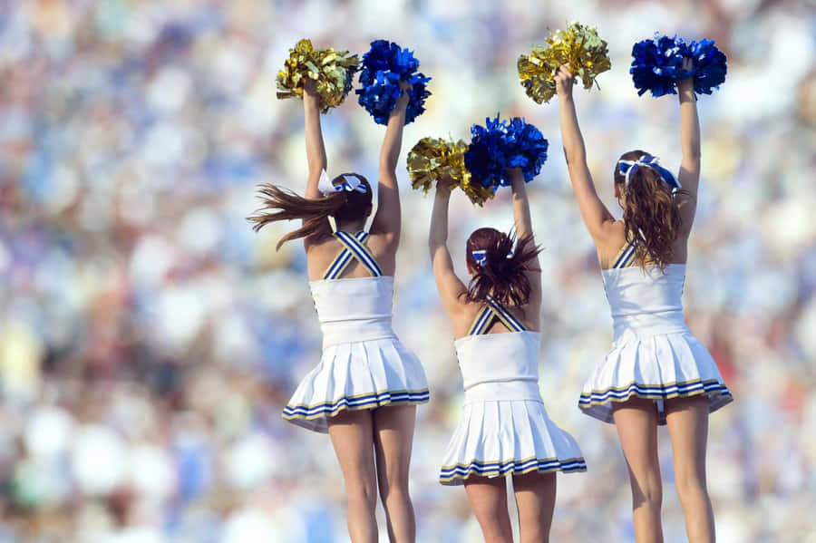 Cheerleaders Performingat Sporting Event.jpg Wallpaper