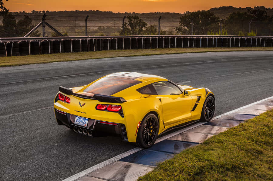 Chevrolet Corvette Grand Sport Cruising On The Open Road Wallpaper