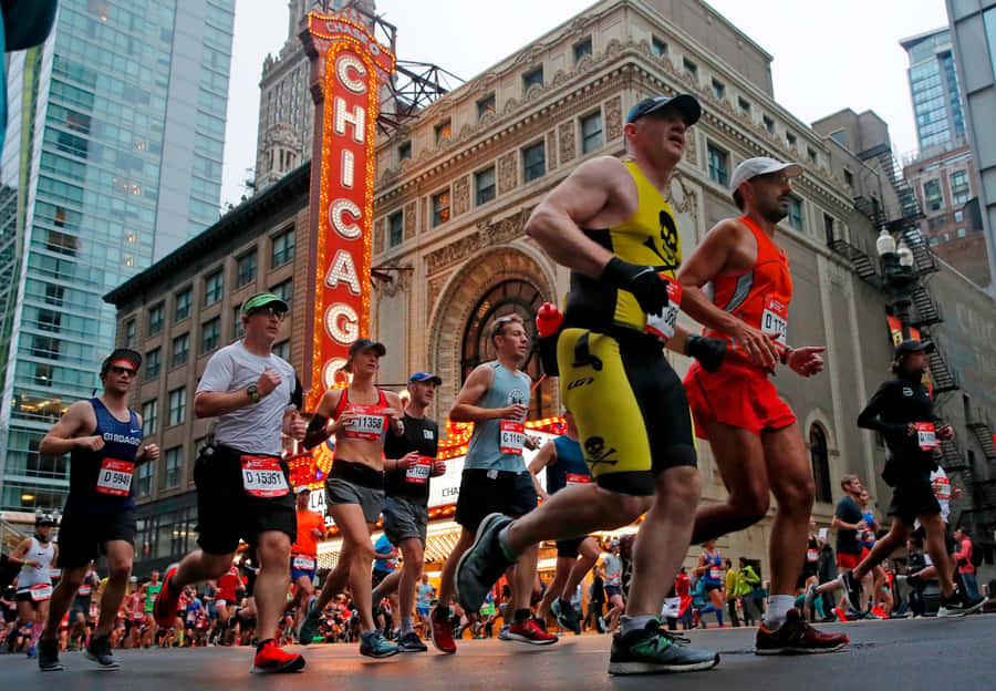 Chicago Marathon Runners Near Sign Wallpaper