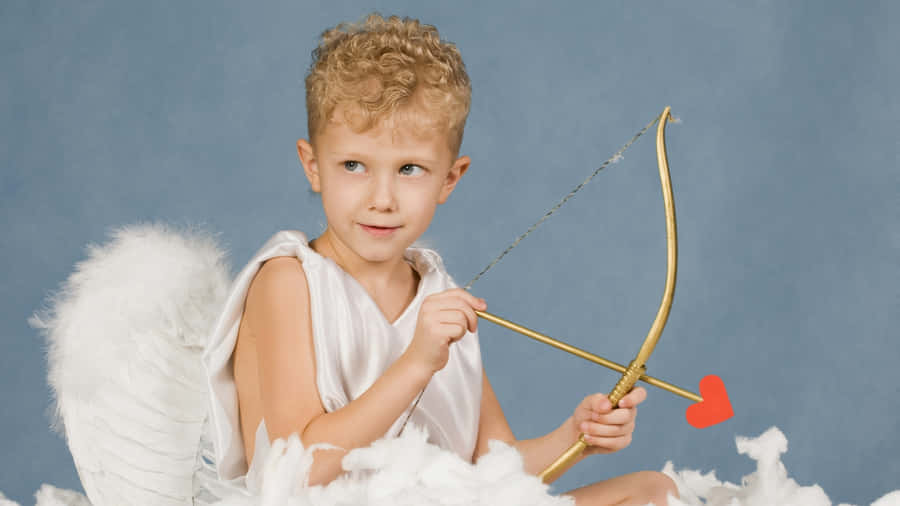 Child Dressed As Cupid Wallpaper