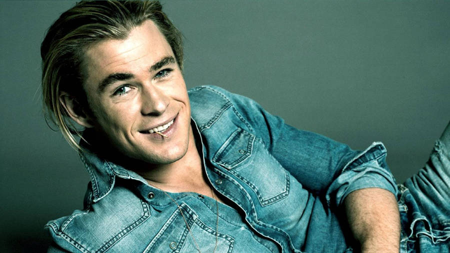 Chris Hemsworth Dressed In A Stylish Denim Outfit Wallpaper