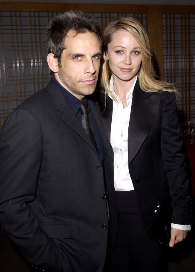 Christine Taylor Posing In Elegant Attire Wallpaper