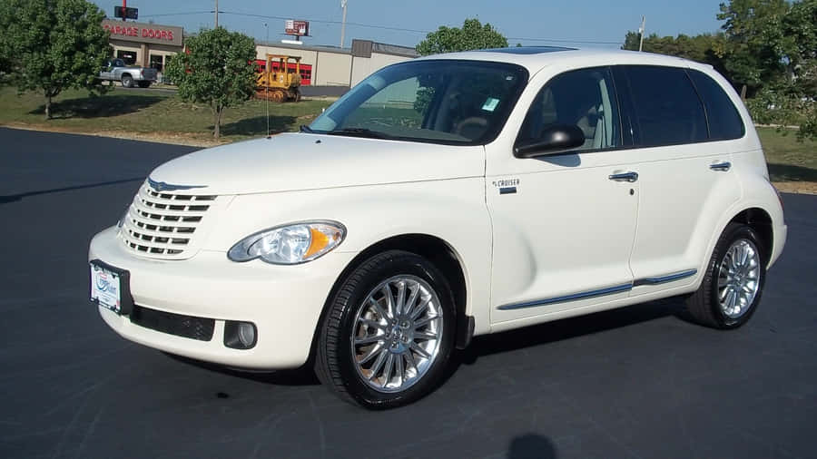Chrysler Pt Cruiser In Picturesque Landscape Wallpaper