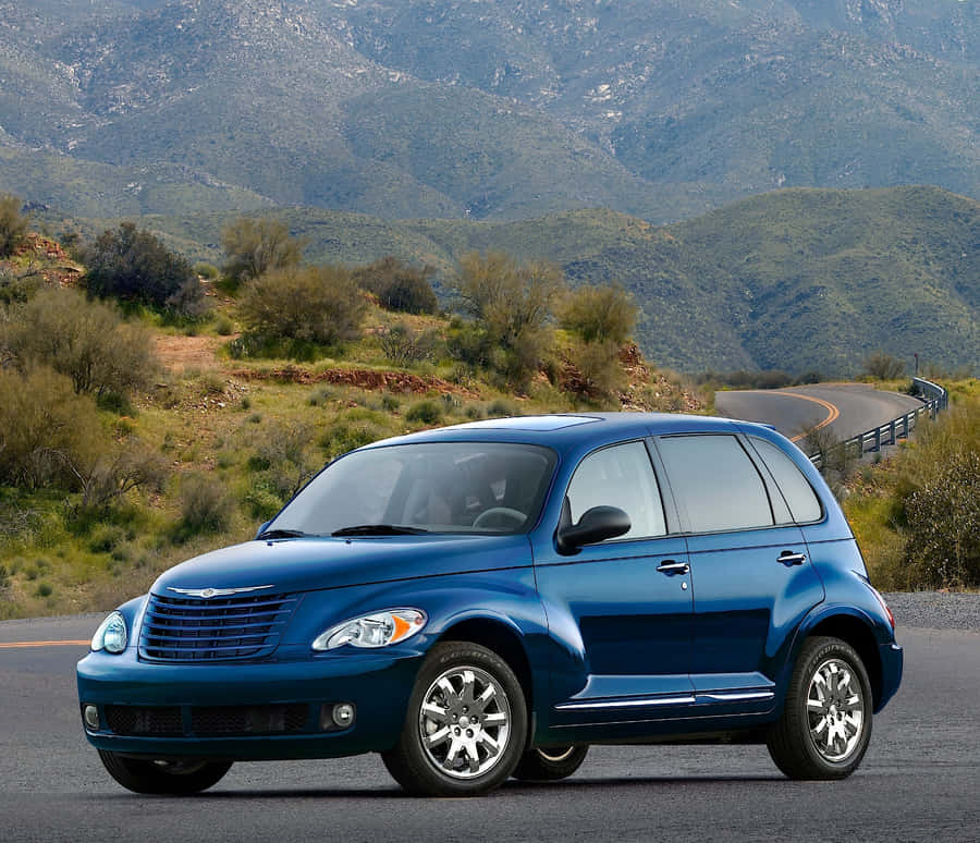 Chrysler Pt Cruiser Parked In Picturesque Location Wallpaper