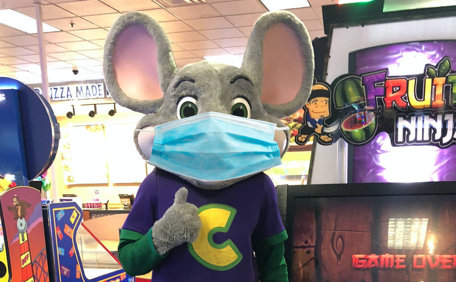 Chuck E Cheese Mascot With Mask Wallpaper