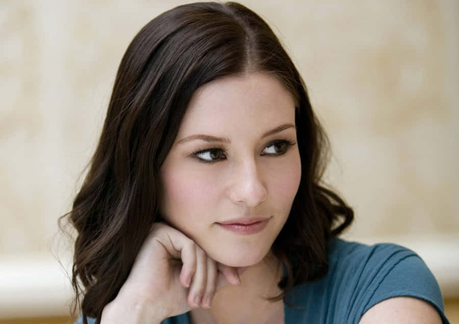 Chyler Leigh Posing At A Photoshoot Wallpaper