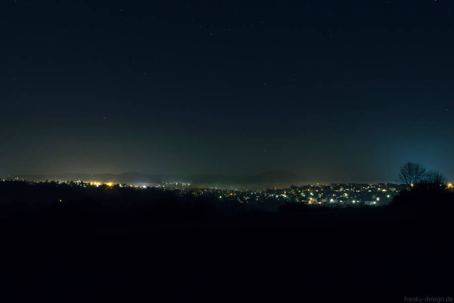 City Lights And Starry Night Wallpaper