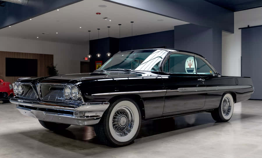 Classic Black Pontiac Ventura Showroom Wallpaper