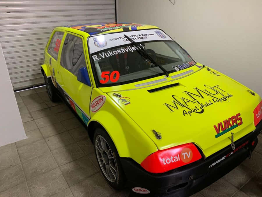 Classic Citroen Ax Parked In Urban Environment Wallpaper