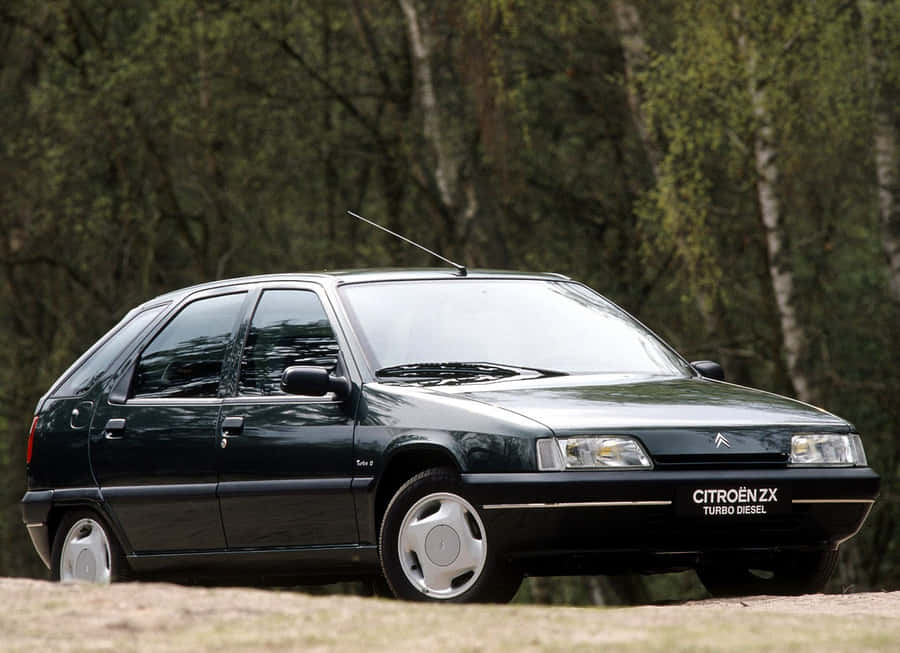 Classic Citroen Zx In Vibrant Red Color Wallpaper