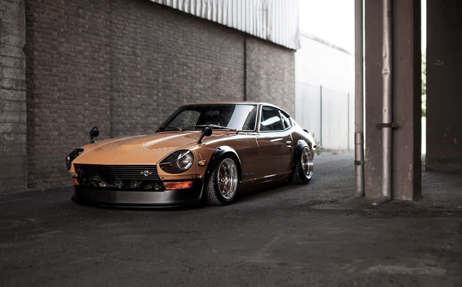 Classic Datsun 1200 In Vibrant Blue Wallpaper