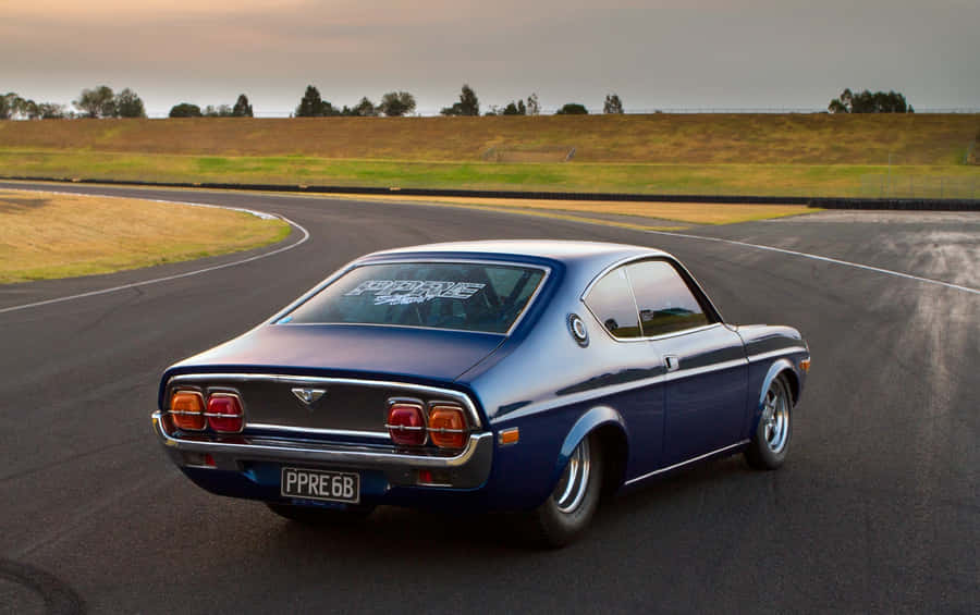 Classic Mazda Rx-3 In Action Wallpaper