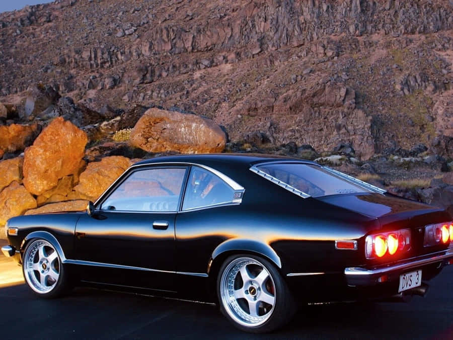 Classic Mazda Rx-3 In Action Wallpaper