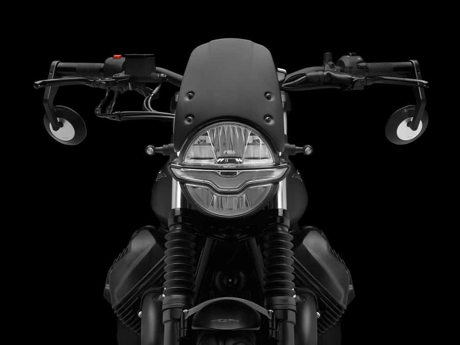 Classic Moto Guzzi Motorcycle On Road Wallpaper