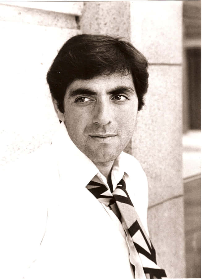 Classic Portraitof Manin Suitand Tie Wallpaper