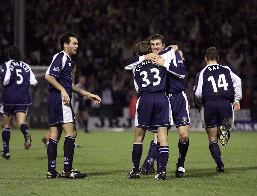 Claudio Caniggia With Rangers Fc Teammates Wallpaper