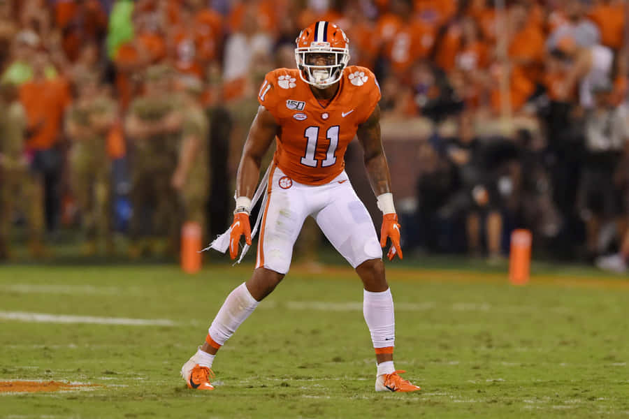 Clemson Football Player Isaiah Simmons Wallpaper