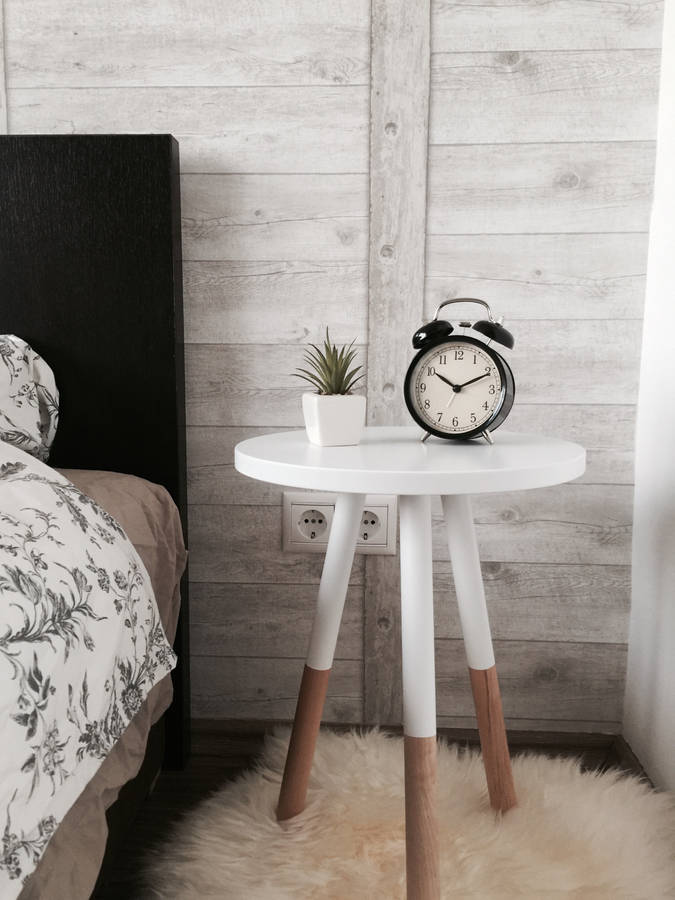 Clock On Side Table Wallpaper
