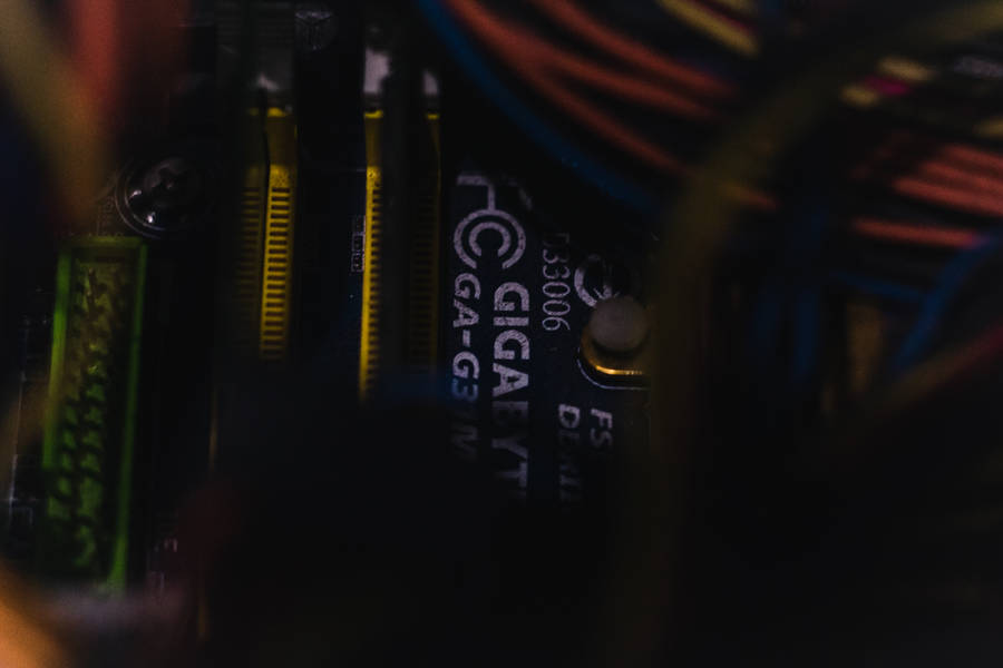 Close-up Shot Of Futuristic Motherboard Circuitry Wallpaper