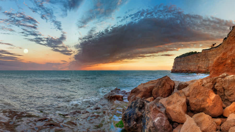 Coastal_ Cliffside_ Sunset_ Panorama Wallpaper
