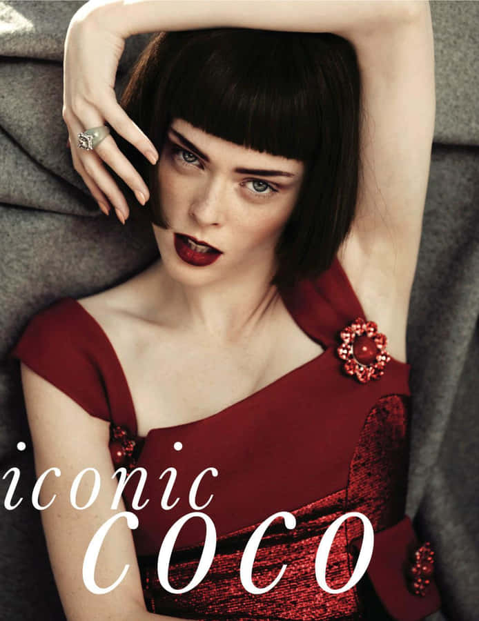 Coco Rocha Strikes A Graceful Pose On A City Street Wallpaper