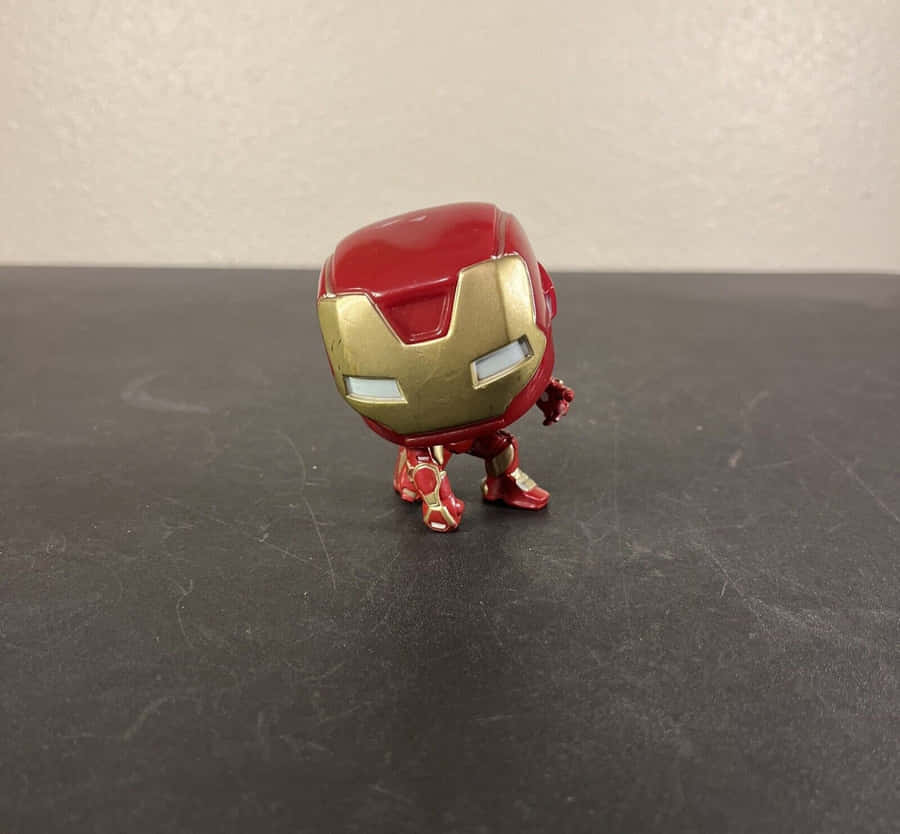 Collect And Display Your Favorite Iron Man Bobblehead Figures Wallpaper