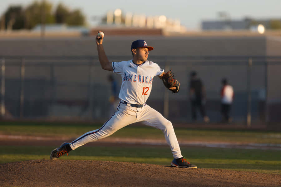 College Baseball Player In Action Wallpaper