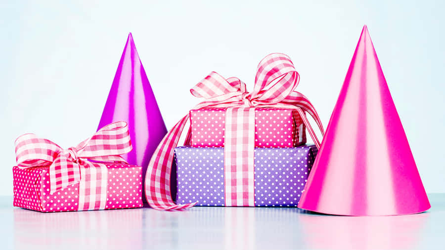 Colorful Gift Boxes And Party Hats Wallpaper